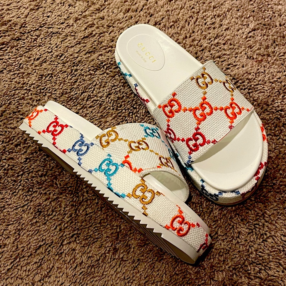 Gucci platform slides.